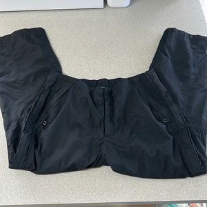 REI women’s snow pants black excellent‎ condition 12 p snaps on ankles